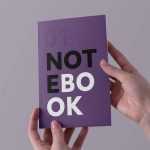 Free Hands Holding Notebook Mockup PSD