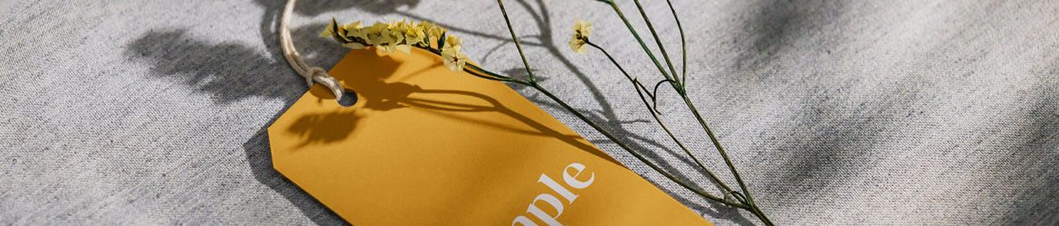 Free Hanging Tag PSD Mockup with Yellow Flower