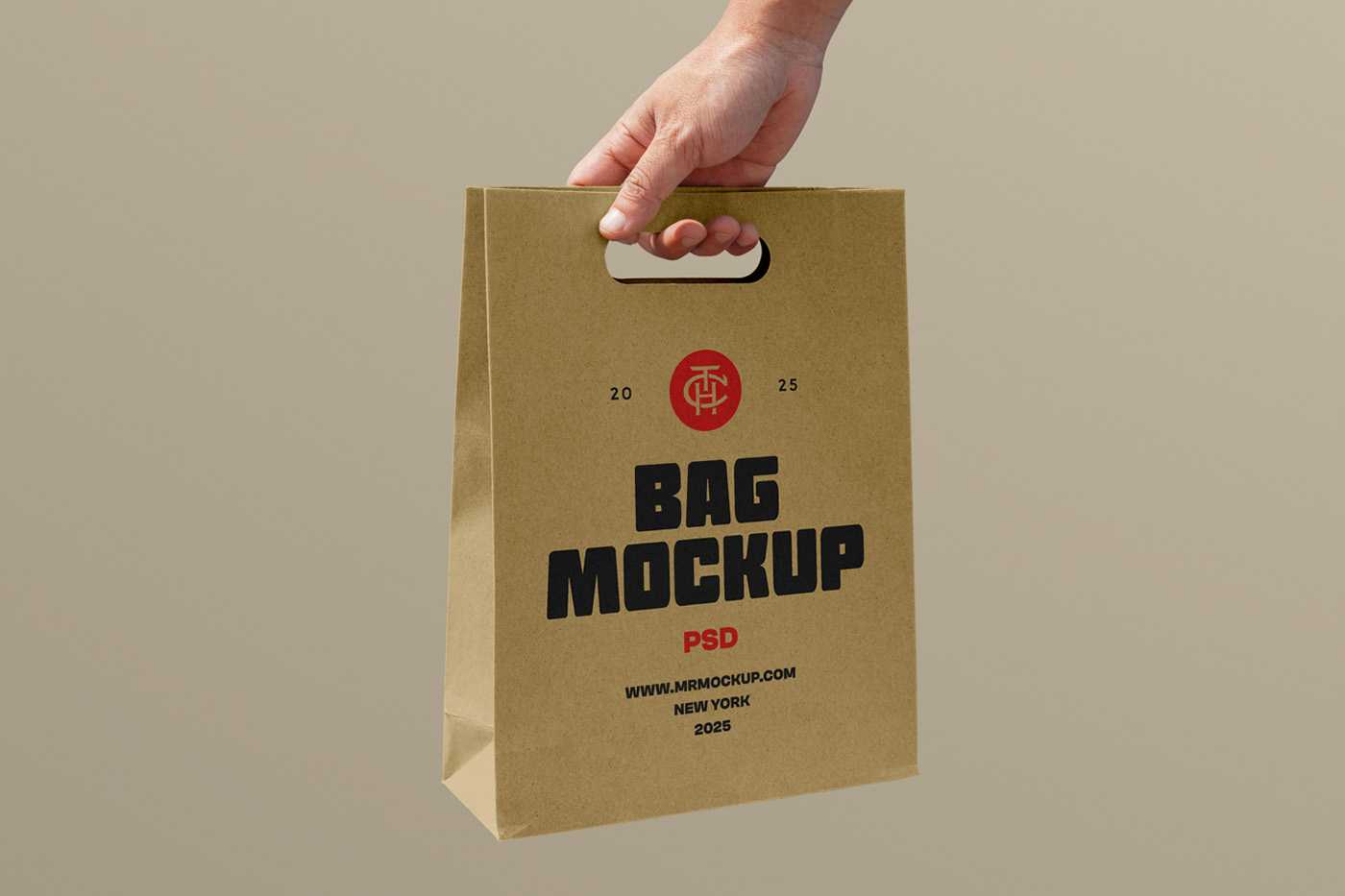 Free Holding Craft Paper Bag Mockup
