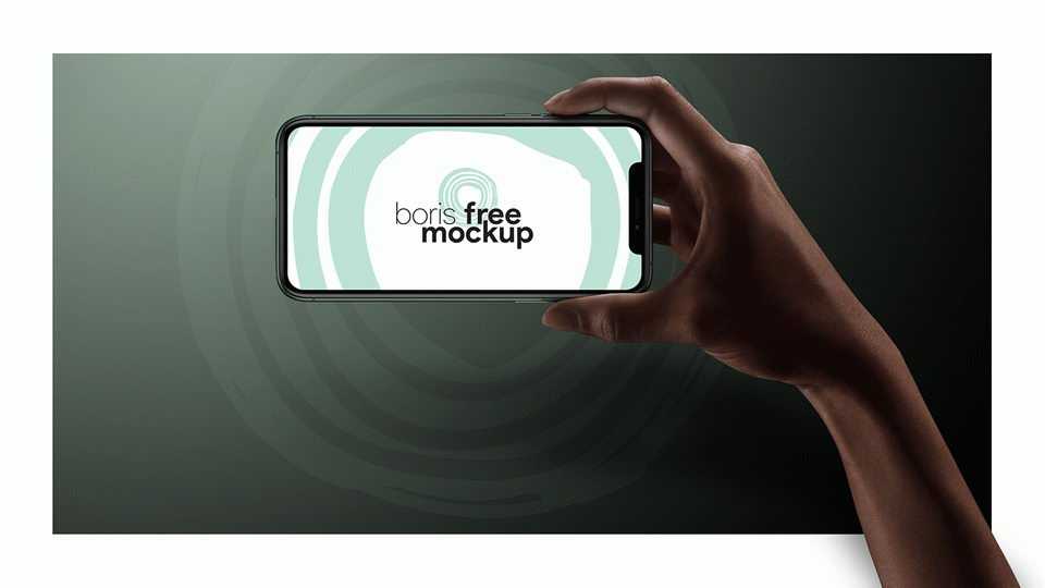 Free iPhone 11 Pro in Hand Mockups PSD