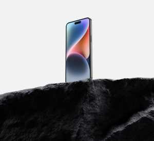 Free iPhone 14 Pro Max Mockup PSD On Rock