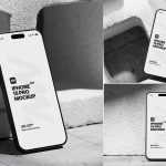 Free iPhone 15 Pro On Concrete Brick Mockup PSD Set