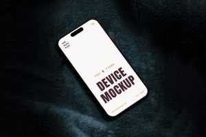 Free iPhone 16 Pro Laying on Sofa Mockup