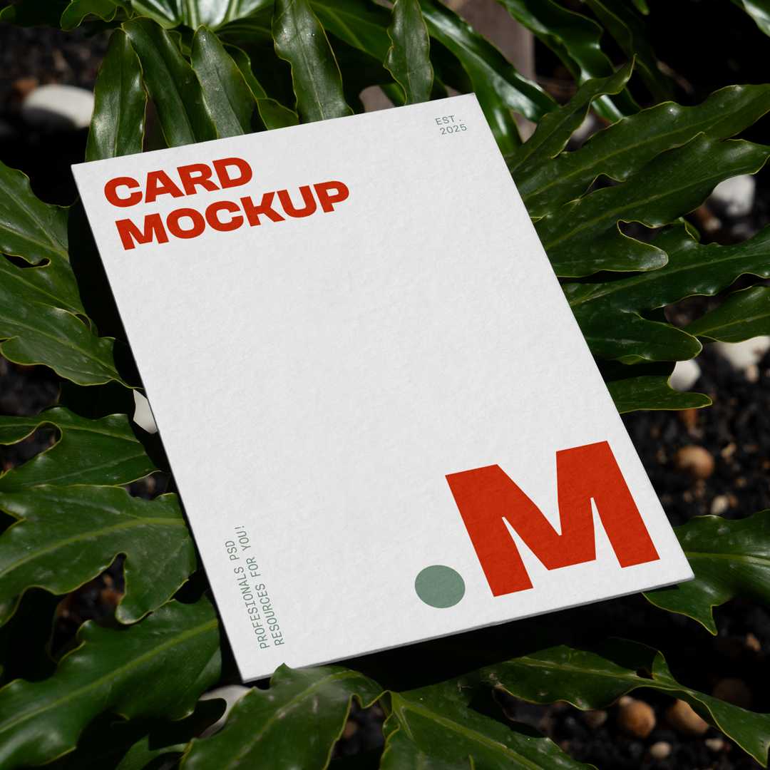 Free Laying Card Between Flowers Mockup