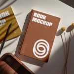 Free Laying Hard Cover Book Mockup