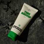 Free Lying on Rock Cosmetic Tube Mockup