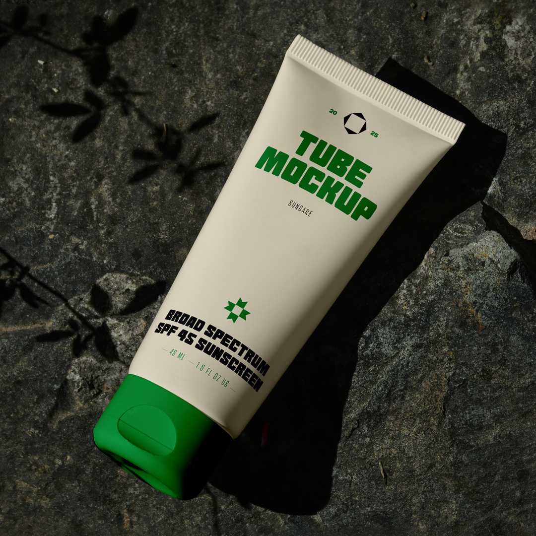 Free Lying on Rock Cosmetic Tube Mockup