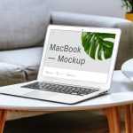 Free MacBook On Table Mockup