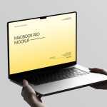Free Macbook Pro Holding By Hand Mockup