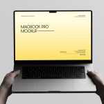 Free Macbook Pro Holding By Hand Mockup Front View
