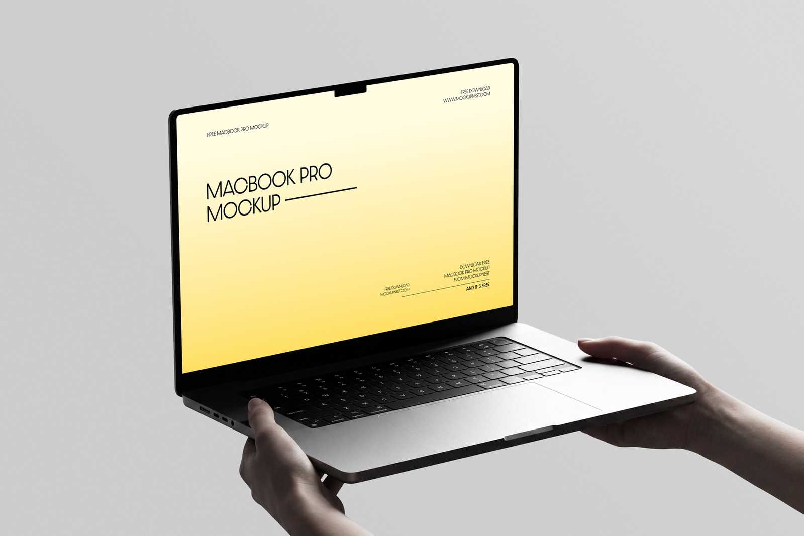 Free Macbook Pro Holding By Hand Mockup