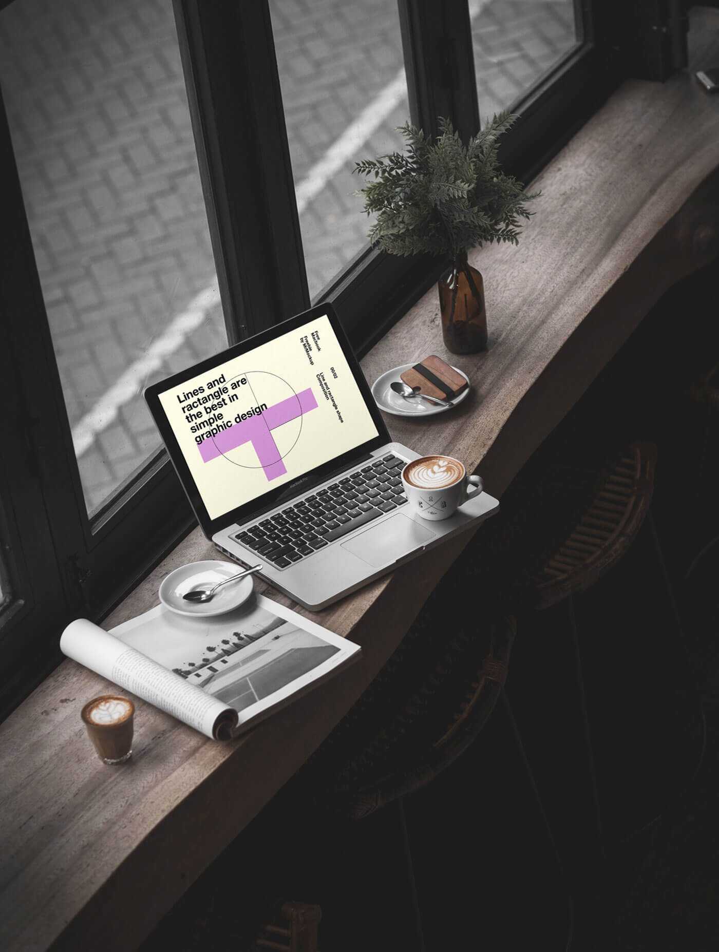 Free MacBook Pro in Cafe Environment Mockup PSD