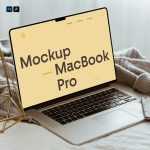 Free MacBook Pro Lying on Bed Mockup