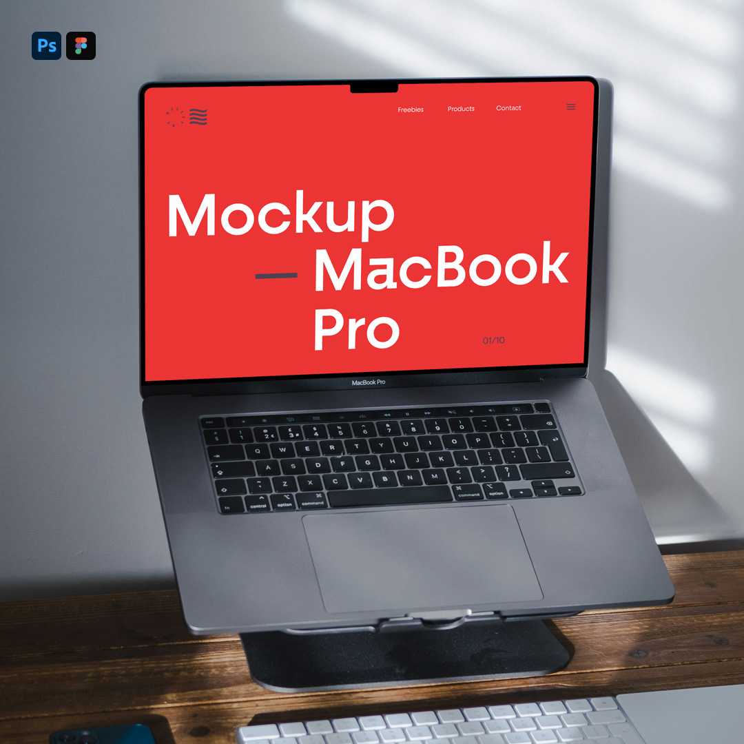 Free MacBook Pro on Stand Mockup