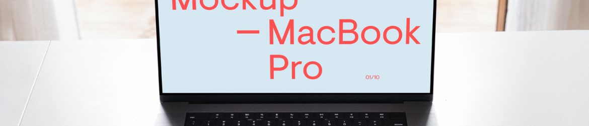 Free MacBook Pro on White Table Mockup