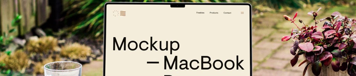 Free MacBook Pro on Wood Desk Mockup