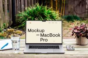 Free MacBook Pro on Wood Desk Mockup