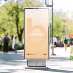 Free Outdoor Pedestal Billboard Mockup on Bright City Pathway
