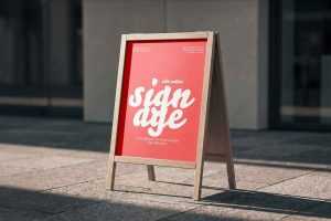 Free Outdoor Wooden A-Frame Store Sign Mockup – Realistic Sidewalk Shop Sign PSD Download