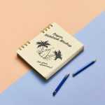 Free Paper Notebook Mockup PSD Lying on Floor