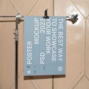 Free Poster Hanging on Tripod Mockup