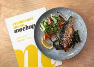 Free Restaurant Menu Mockup with Fish Dish on a Plate