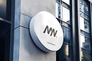 Free Round Signboard Mockup On Building Wall