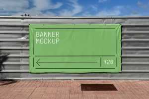 Free Sheet Banner Mockup on Steel Fence