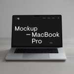 Free Silver MacBook Pro Mockup PSD on Desk Free PSD