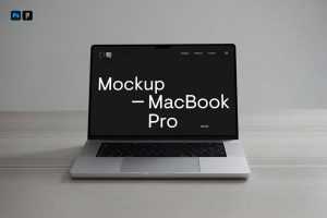 Free Silver MacBook Pro Mockup PSD on Desk Free PSD