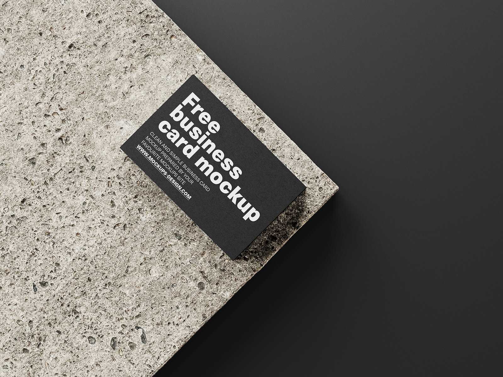 Free Single Business Card Mockup PSD set On A Concrete Brick