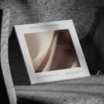 Free Square Magazine Cover Mockup on Textured Fabric Chair