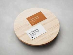 Free Textured Business Card Mockup PSD set On Wooden Board PSD