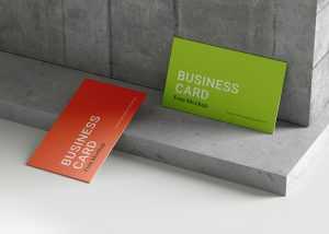 Free Two Business Cards Mockup on Textured Concrete Wall