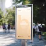 Free Vertical Street Billboard Mockup in Sunny Park Pathway Scene