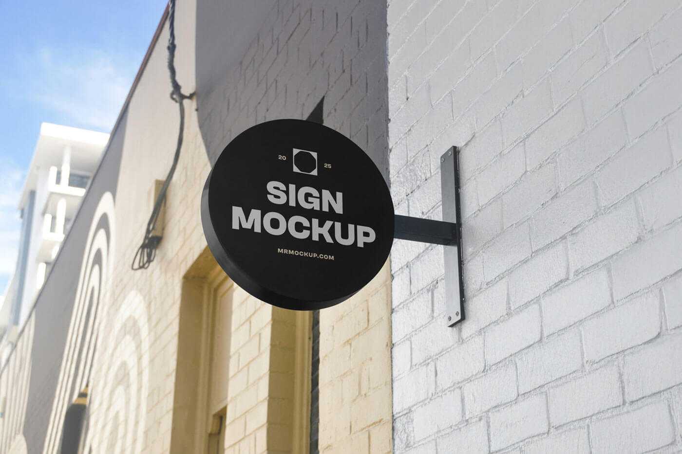 Free Wall-Mounted Round Shop Sign Mockup PSD