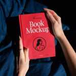 Free Woman Holding Book PSD Mockup