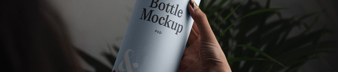 Free Woman Holding Bottle Mockup