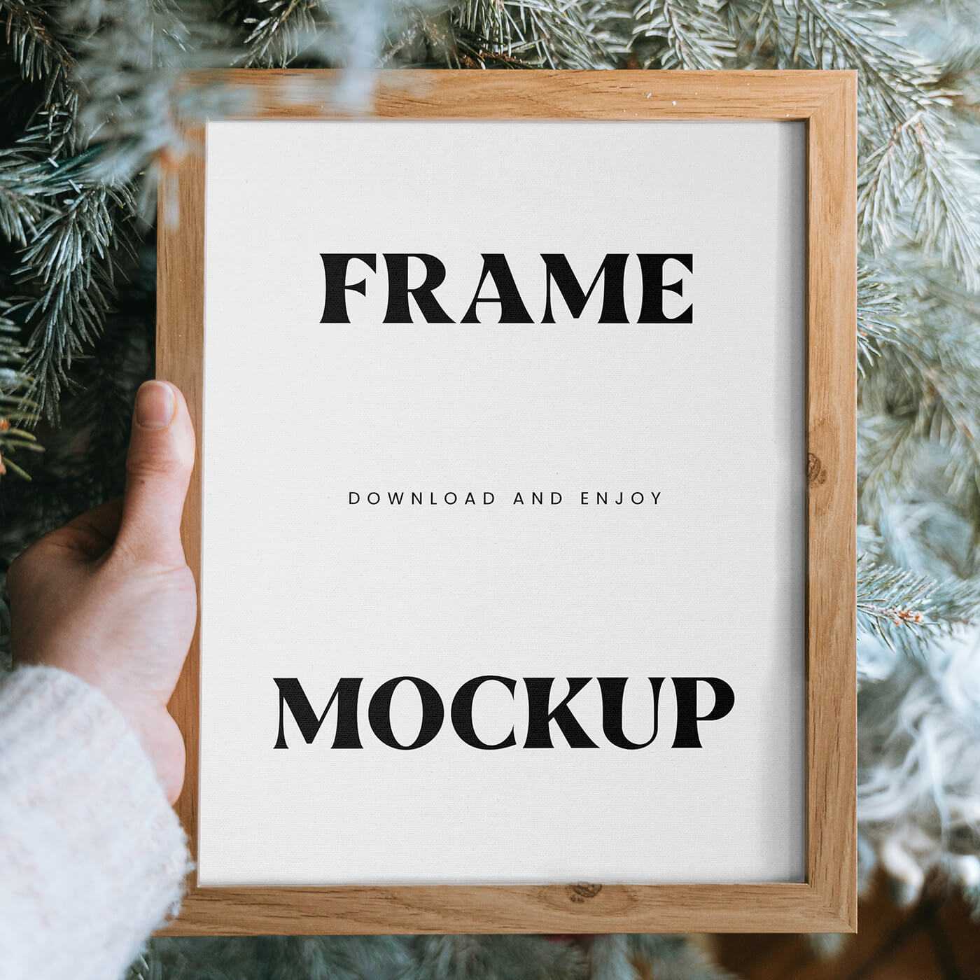 Free Wooden Photo Frame Mockup in Hand