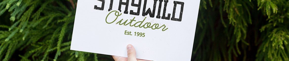 Free Xmas Greetings Card in Hand Mockup PSD