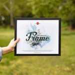 Girl Showing Picture Frame Free PSD Mockup