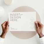 Hand Holding Landscape Letter Free Mockup PSD