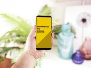 Hand Holding Smartphone Mockup Free