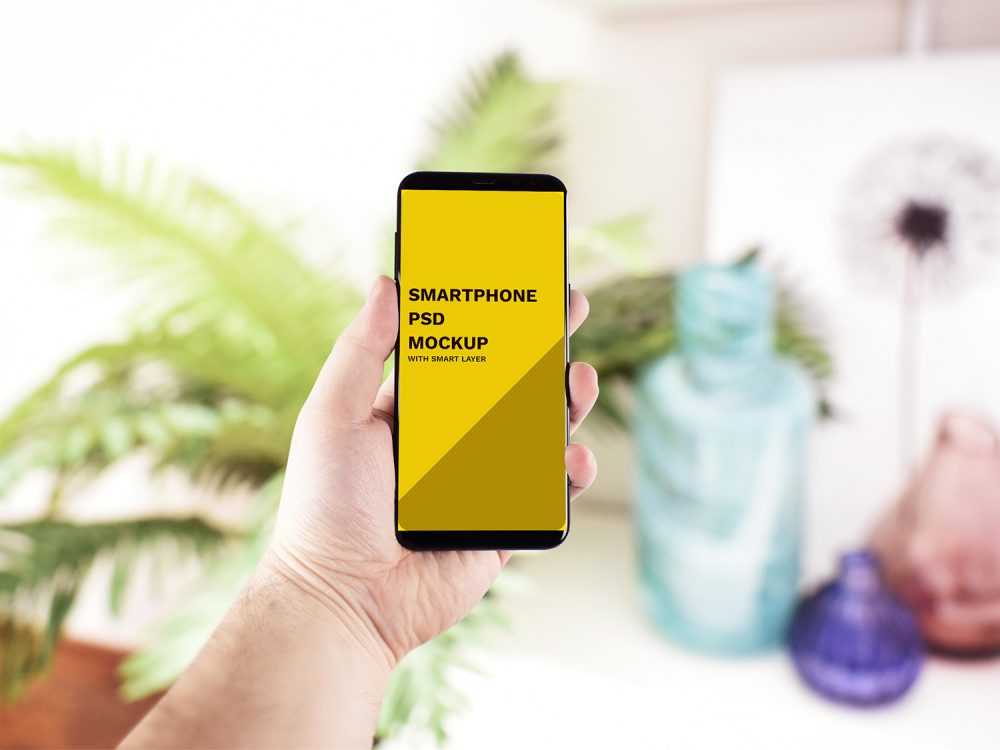 Hand Holding Smartphone Mockup Free