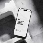 Iphone 15 Pro On Concrete Brick Mockup