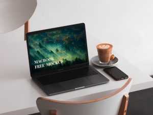 MacBook on a Table Mockup Free PSD