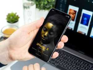 Man Holding iPhone X Mock-up