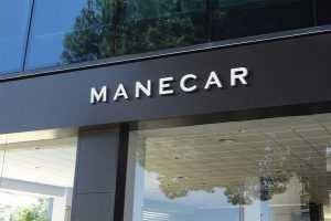 Shop Front Facade Free Logo Signage Mockup PSD