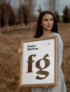 Women Holding Poster Mockup PSD free