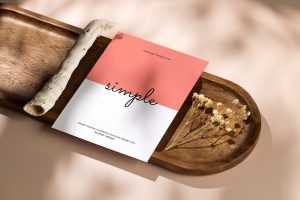 A6 flyer on tray with dried plants mockup